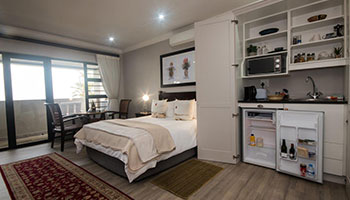 Room 1 bedroom at Hillside Guesthouse with quality percale bedding, air conditioning and stylish guesthouse interior in Umhlanga Rocks