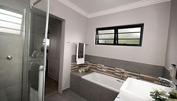 Room 1 en-suite bathroom at Hillside Guesthouse with modern guest facilities for accommodation in Umhlanga Rocks