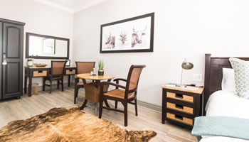 Room 4 luxury guesthouse suite with comfortable bedding, private accommodation and elegant decor at Hillside Guesthouse in Umhlanga Rocks