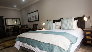 Room 4 bedroom at Hillside Guesthouse with quality percale bedding, air conditioning and stylish guesthouse interior in Umhlanga Rocks